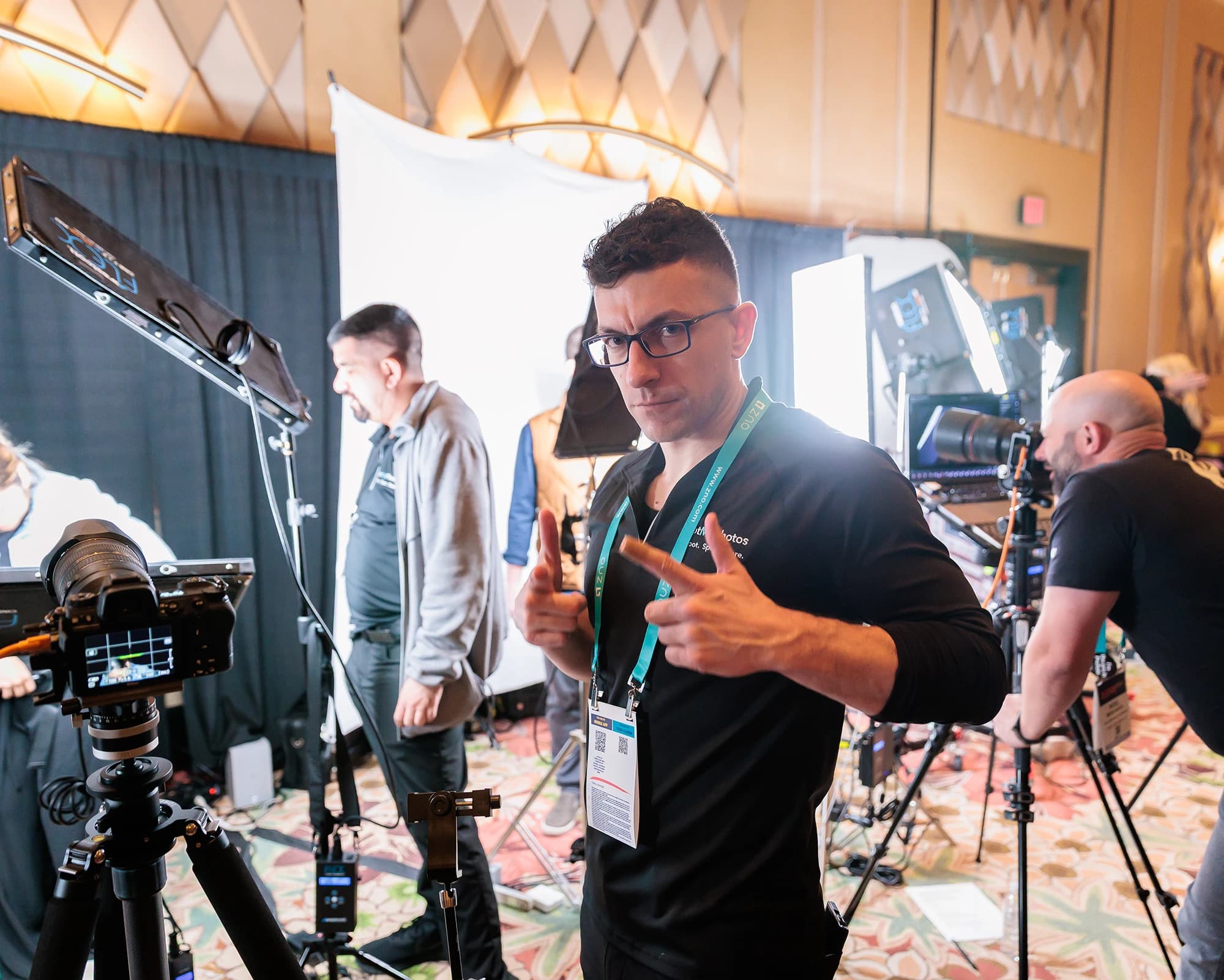 Chad Isaiah photographing a client in the studio