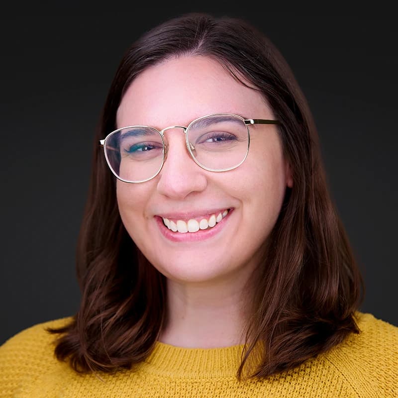 Professional headshot wearing Yellow