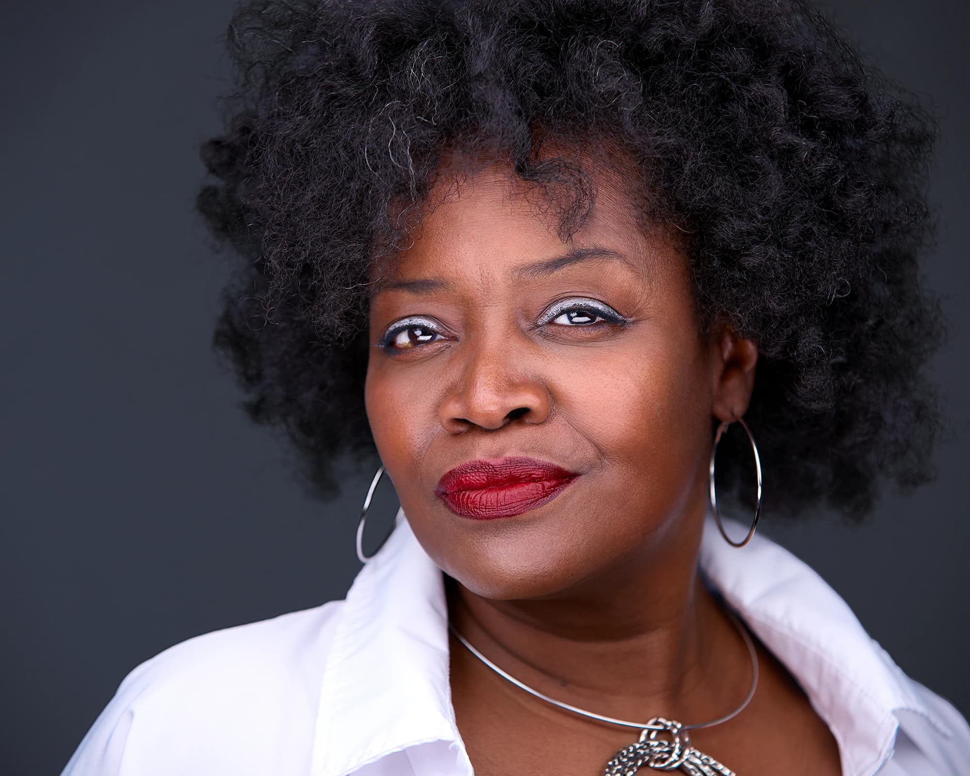 Business headshot of female professional with natural expression