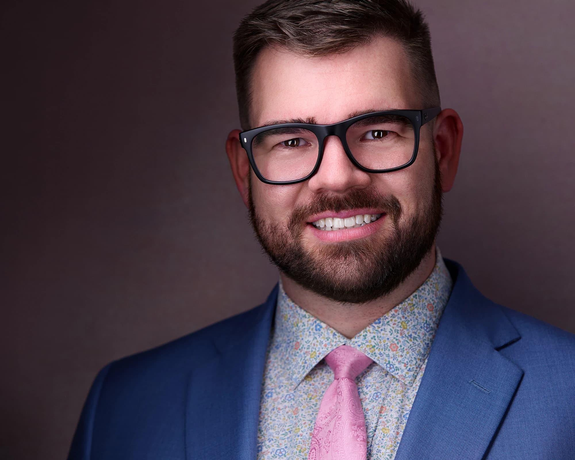 Professional executive headshot with studio lighting