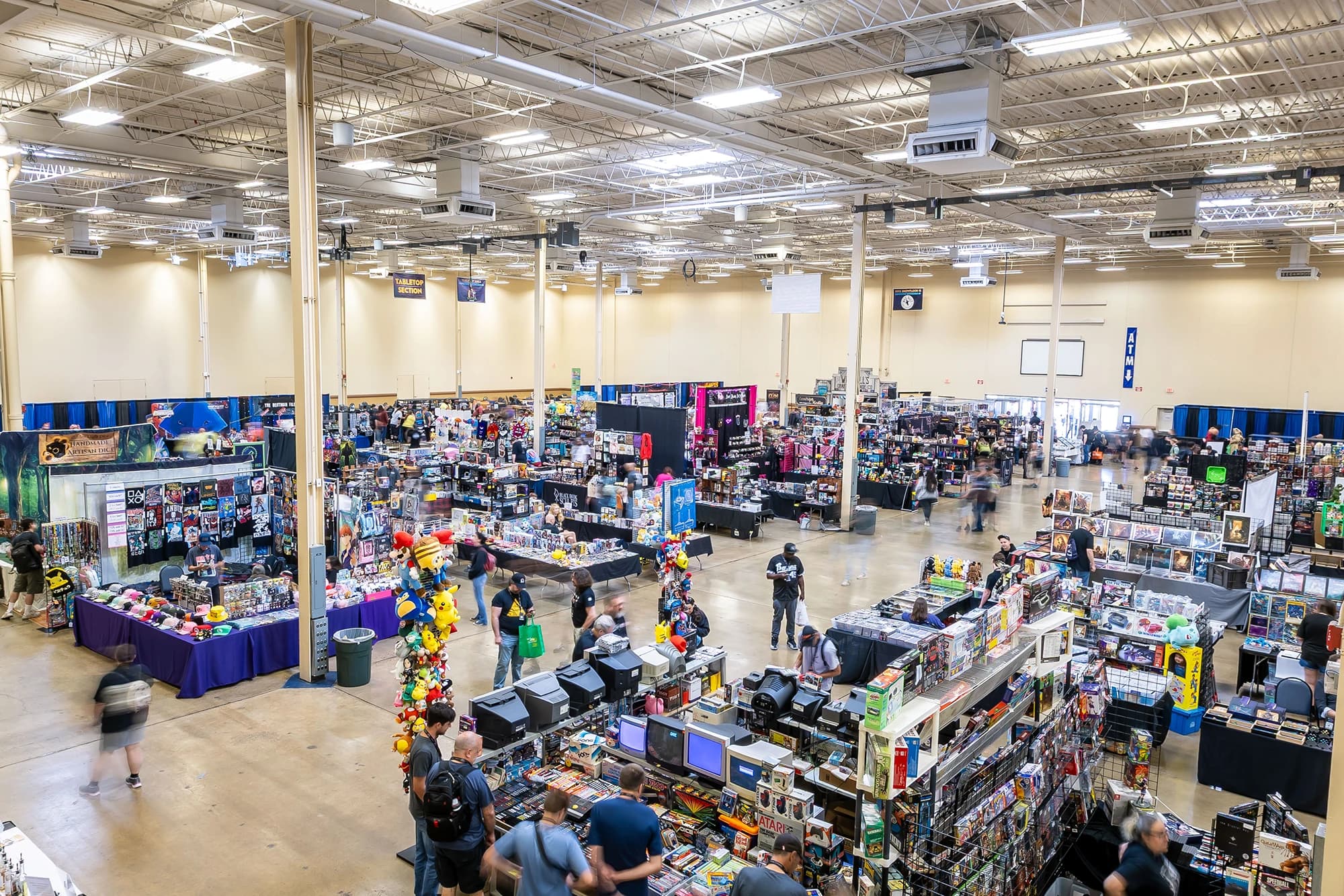 Pittsburgh Gaming Expo convention floor with video game displays