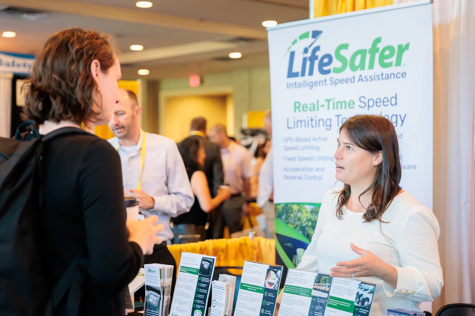 GHSA 2025 highway safety trade show booth with attendee interaction