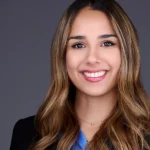 headshot of eaton corporation woman with brown hair in suit jacket