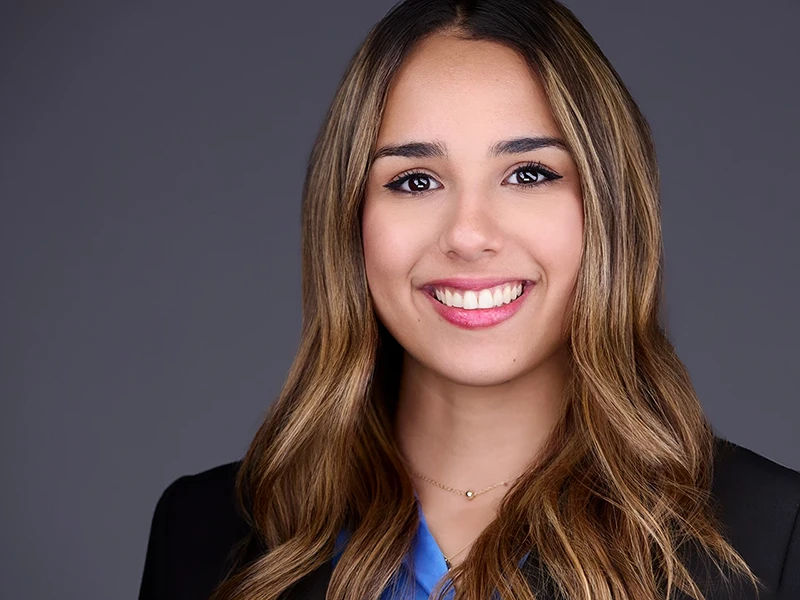 headshot of eaton corporation woman with brown hair in suit jacket