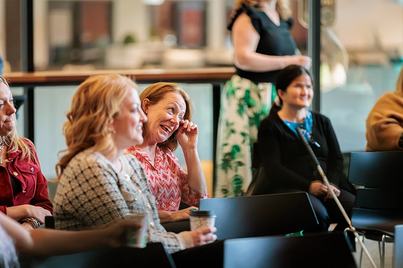 Candid of woman crying and laughing at a professional conference at OneValley in Pittsburgh