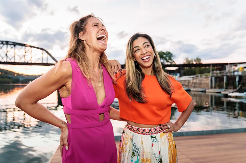 Ladies laughing outside at a networking event in Pittsburgh